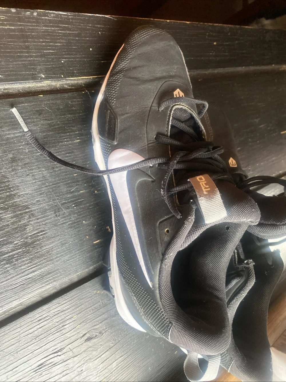 Nike Men’s Black Athletic Cleats with White Swoosh sports cleats